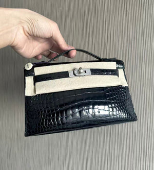 Hermès kelly Pochette Black Shiny crocodile leather palladium hardware