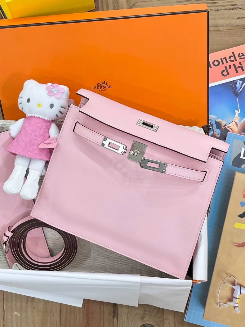 Hermès Kelly Danse bag in cherry pink, silver trim, Swift leather, K engraving, new.