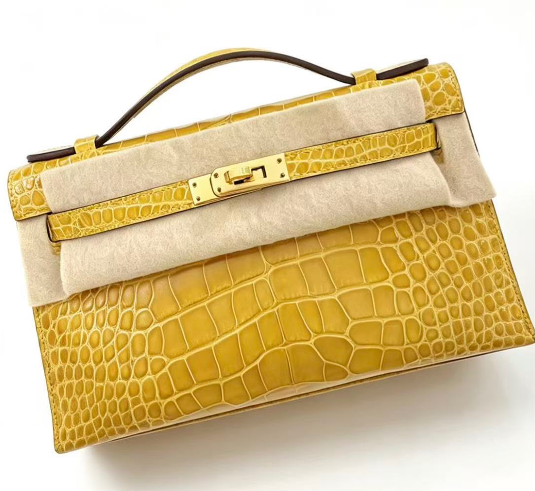 Hermes kelly pochette Jaune Ambre shiny alligator gold hardware