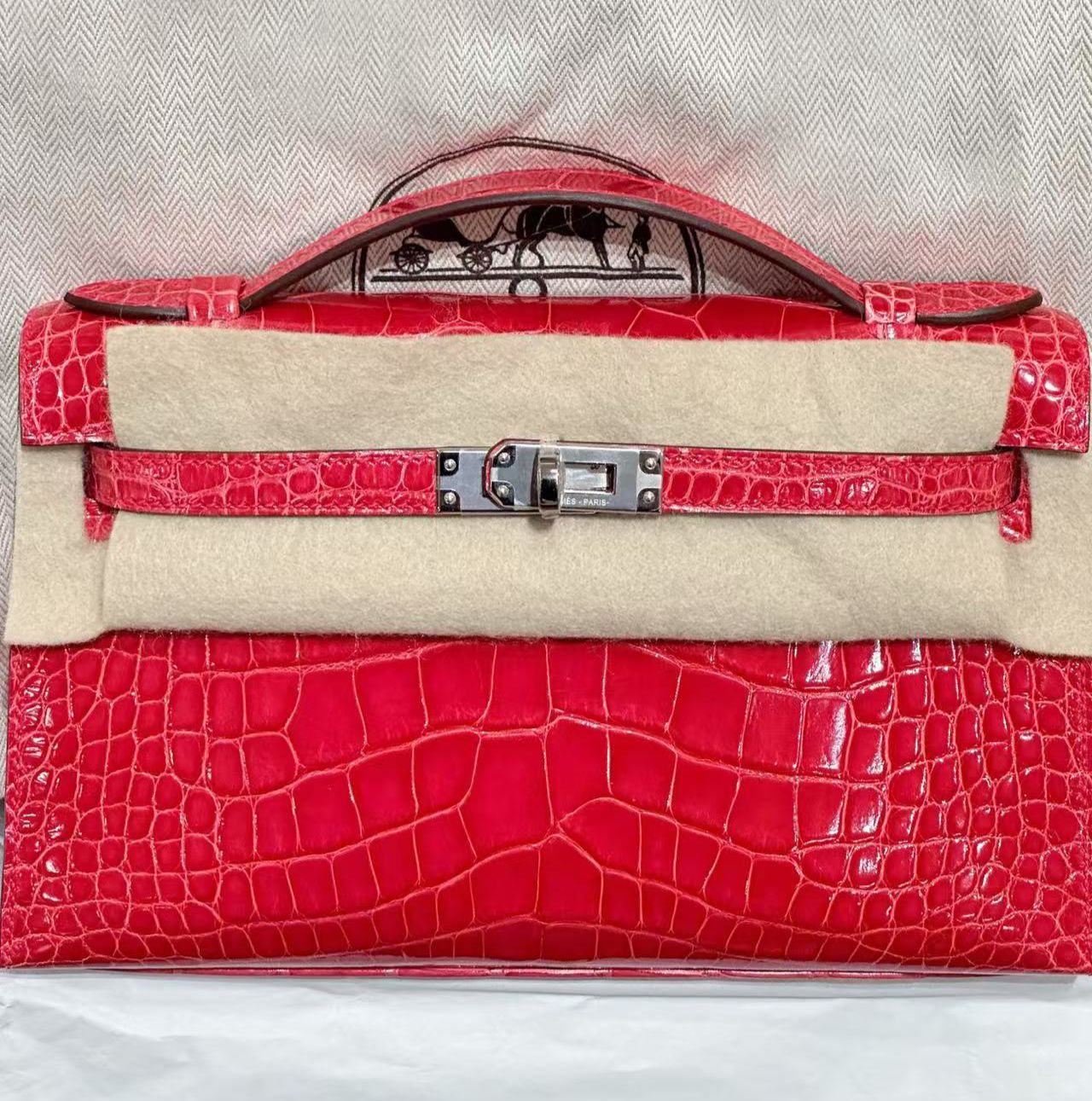 Hermès Kelly pochette rose extreme shiny alligator palladium hardware