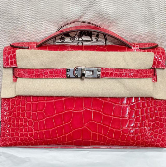 Hermès Kelly pochette rose extreme shiny alligator palladium hardware