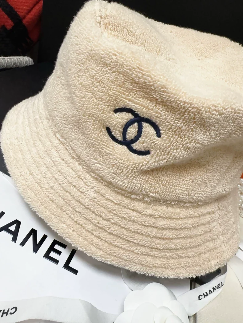 Chanel classic khaki hat with navy blue terry cloth lining