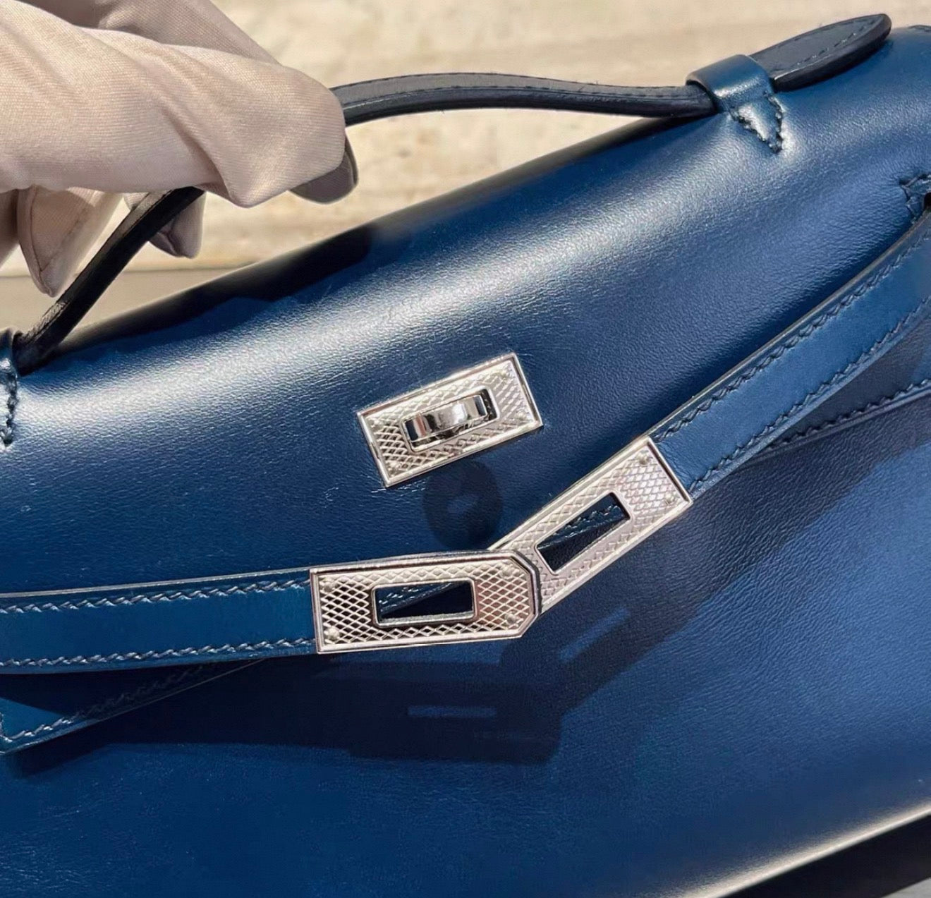 Hermès Kelly pochette Prussian Blue box leather guilloche hardware