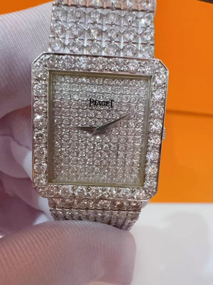 Vintage Piaget mens watch with diamond-set bezel and bracelet, quartz movement