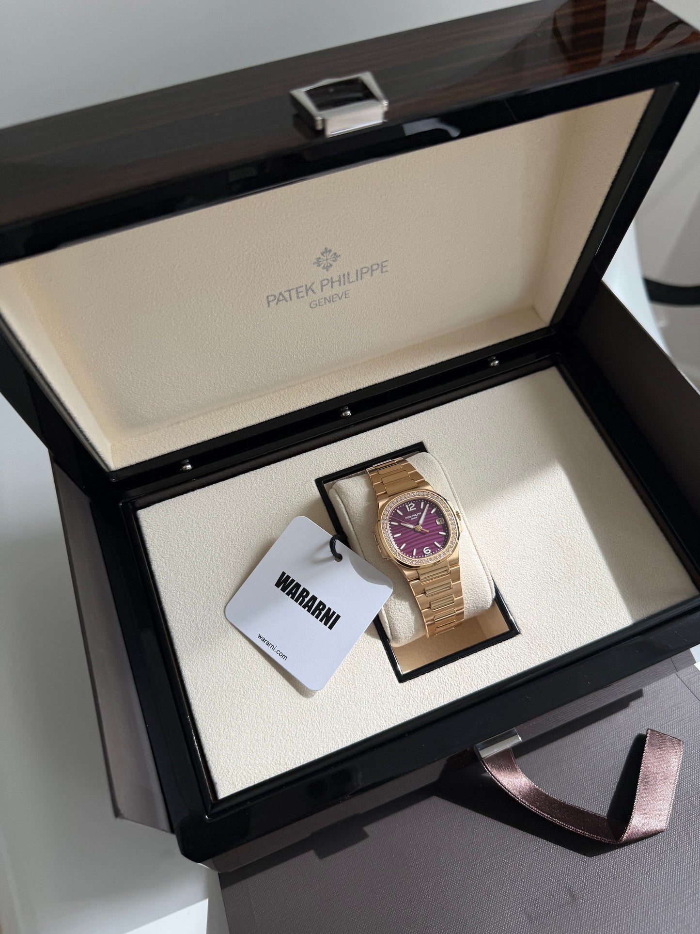 Patek Philippe Nautilus 7010/1R-013 Ladies Quartz Rose Gold Purple Diamond Bezel (2025)