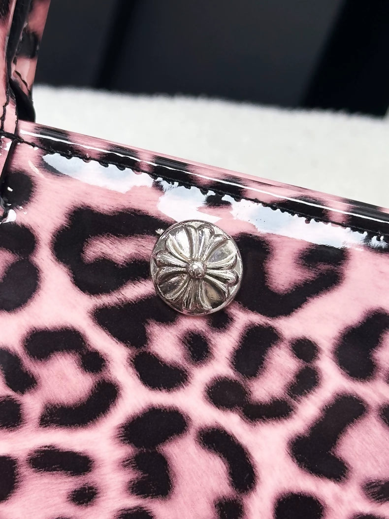 Chrome Hearts mini handbag in pink patent leather with leopard print