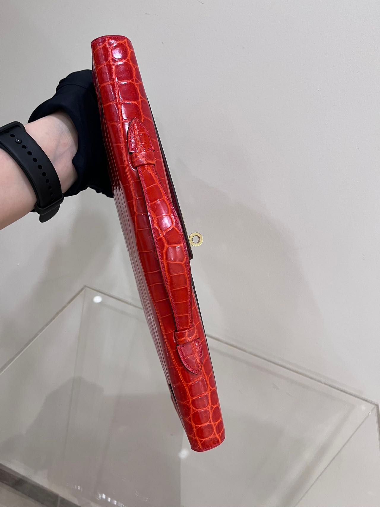 Hermes Kelly cut red shiny crocodile leather gold hardware