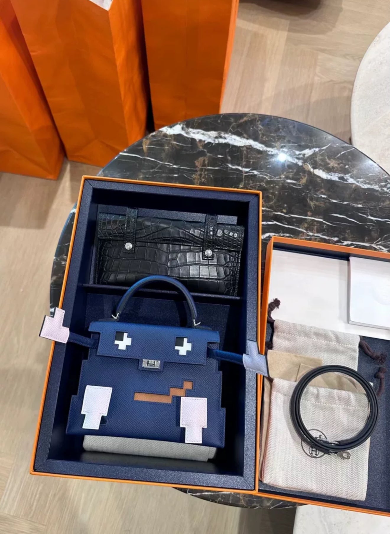 Limited Edition Hermès Kelly Doll Picto in Bleu Saphir, Mauve Pâle, Gold Epsom Leather  Black Matte Alligator with Palladium Hardware