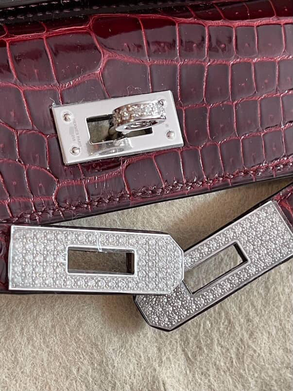 Hermès Kelly Cut Bourgogne Shiny Porosus Diamond Hardware