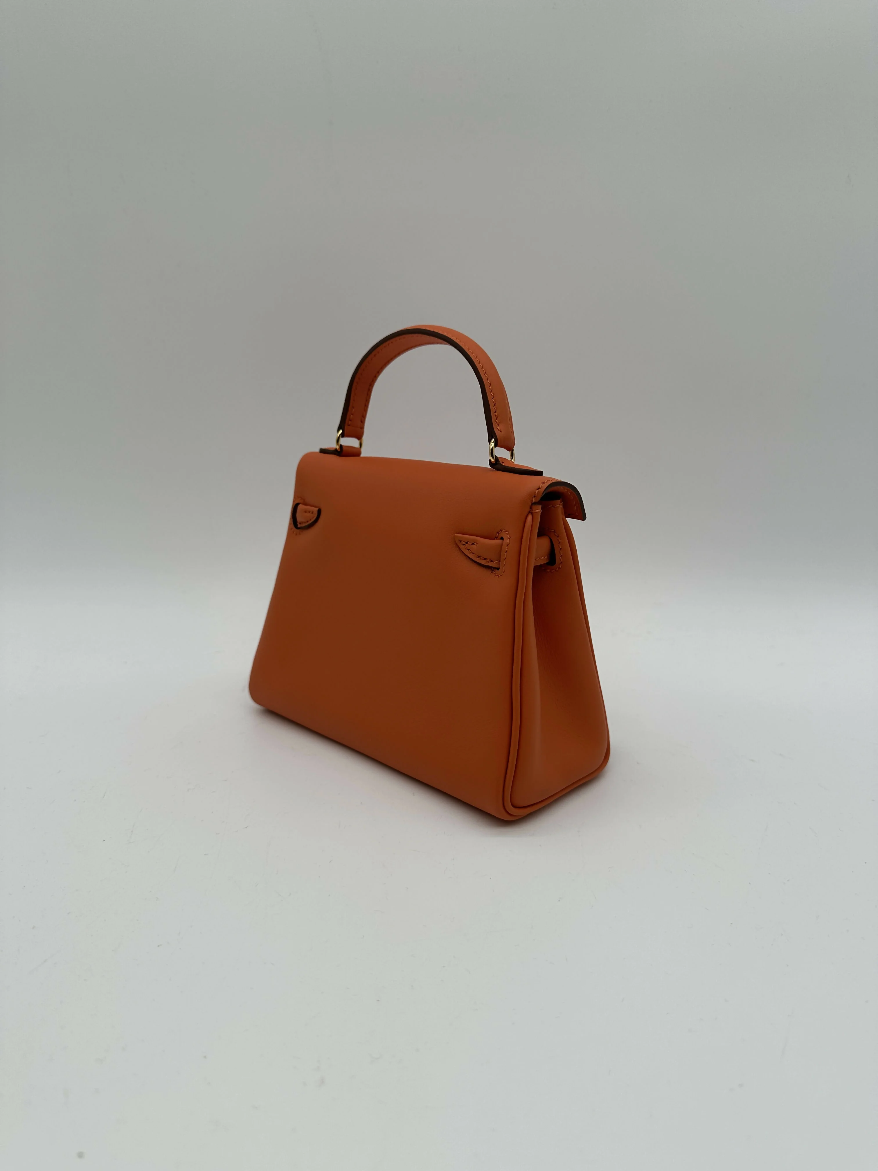 Hermès Kelly Doll Orange / Rose Sakura PHW W 2026