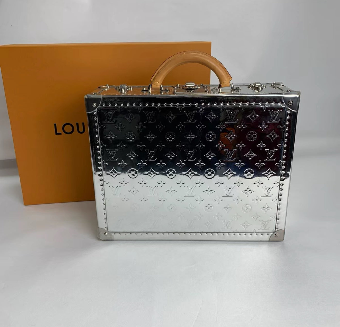 LOUIS VUITTON Silver Mirror Monogram Vinyl  Vachetta Leather Cotteville 40