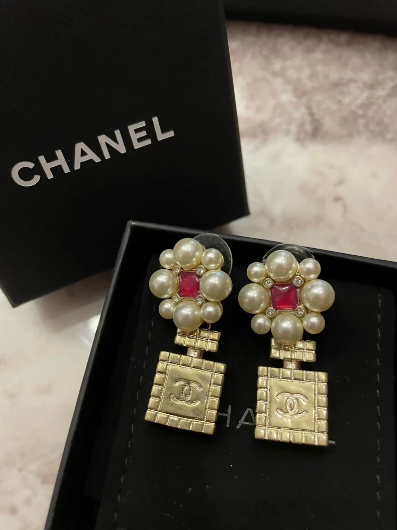 Chanel 21P floral perfume bottle earrings