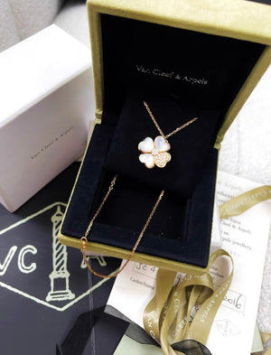 Van Cleef  Arpels Cosmos clip pendant, medium model 18K rose gold, Diamond, Mother-of-pearl