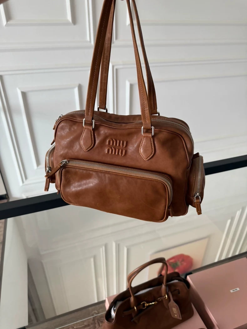 Miu Mius Spring/Summer 2024 vintage style brown tote