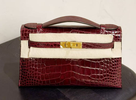 Hermès Kelly Pochette Pochette Bourgogne shiny alligator gold hardware