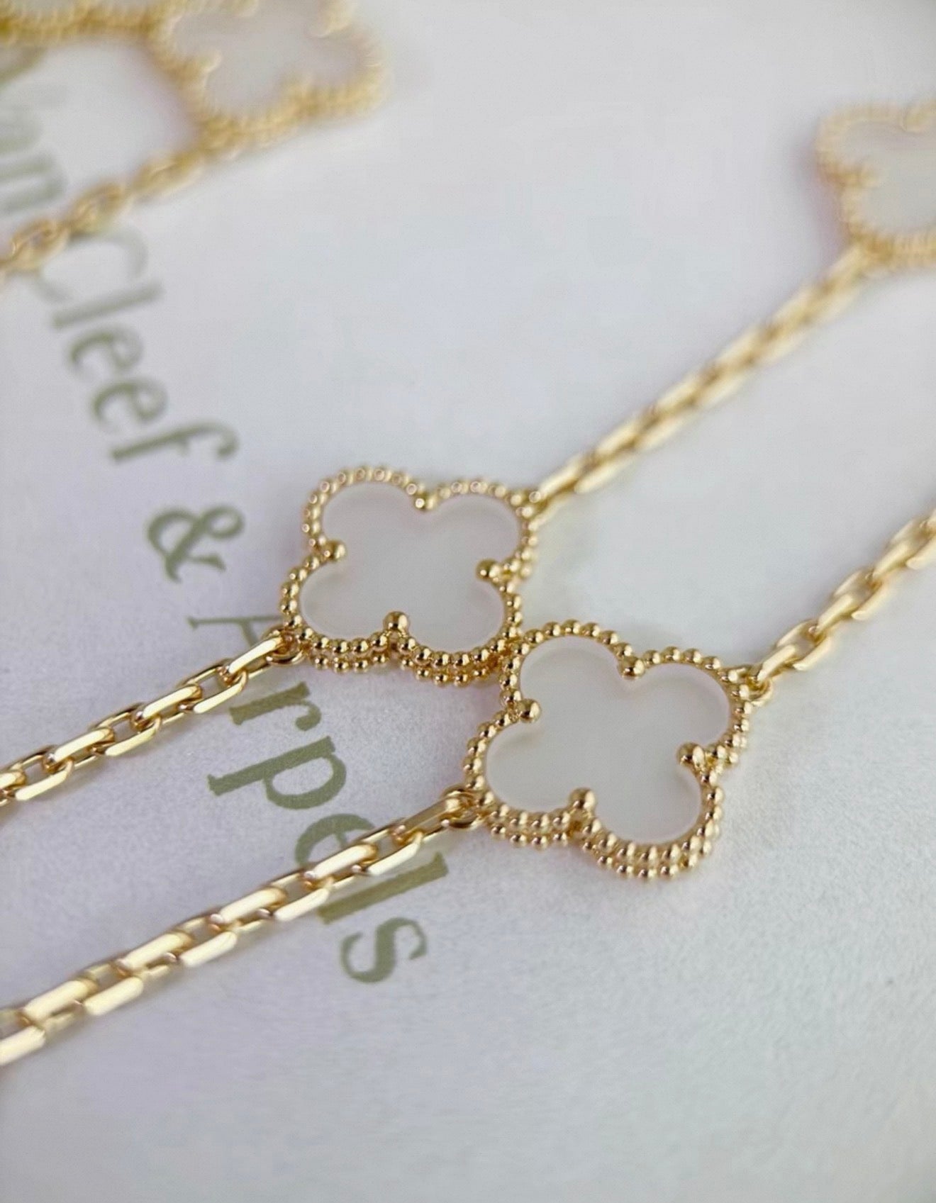Van Cleef  Arpels Gold and Rock Crystal Vintage Alhambra 20 Motifs Long Necklace, Chain