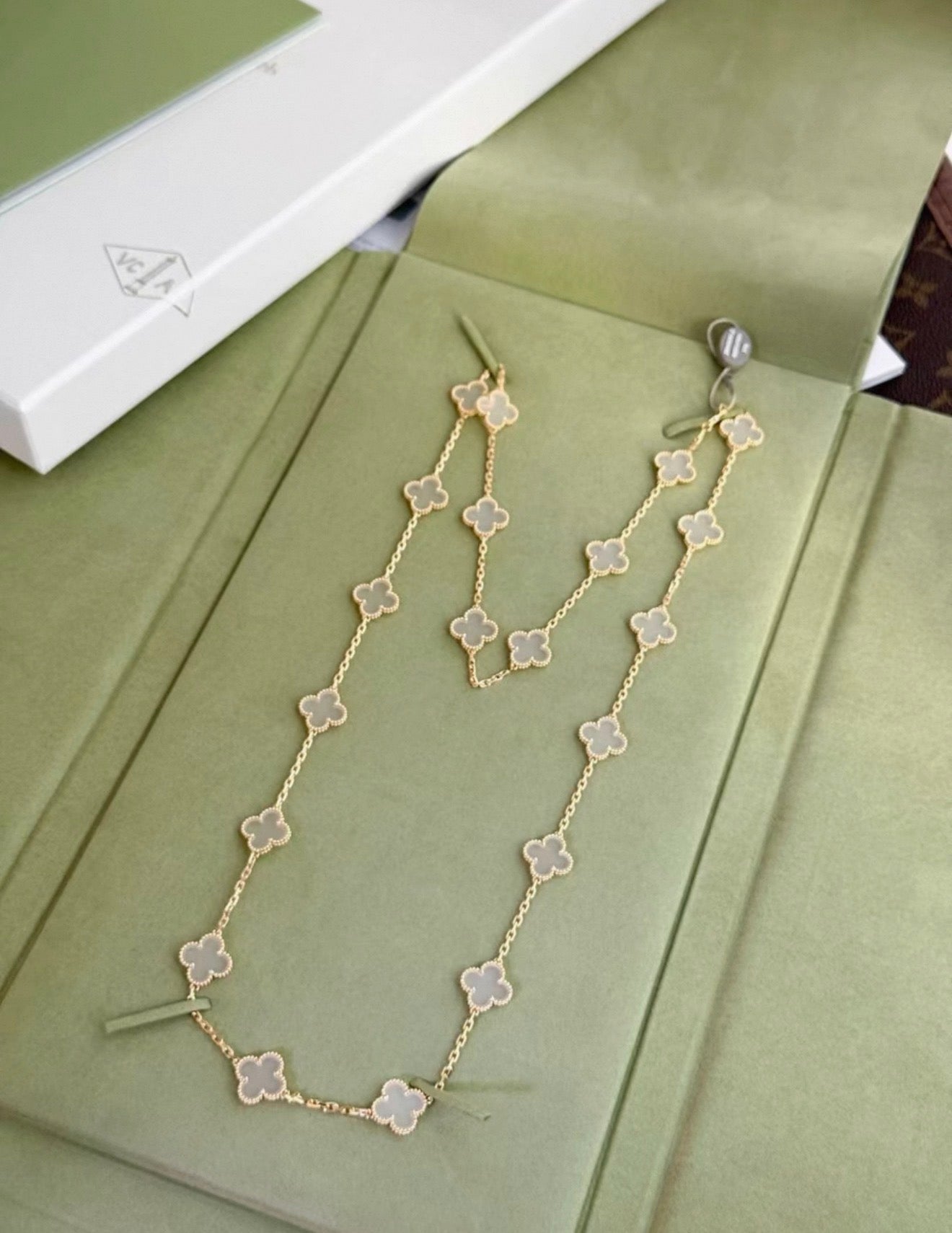 Van Cleef  Arpels Gold and Rock Crystal Vintage Alhambra 20 Motifs Long Necklace, Chain