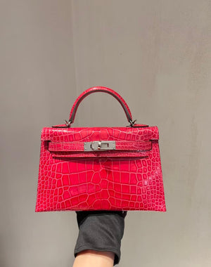 Hermès Mini kelly 20 Rose Extrême Shiny alligator leather palladium hardware