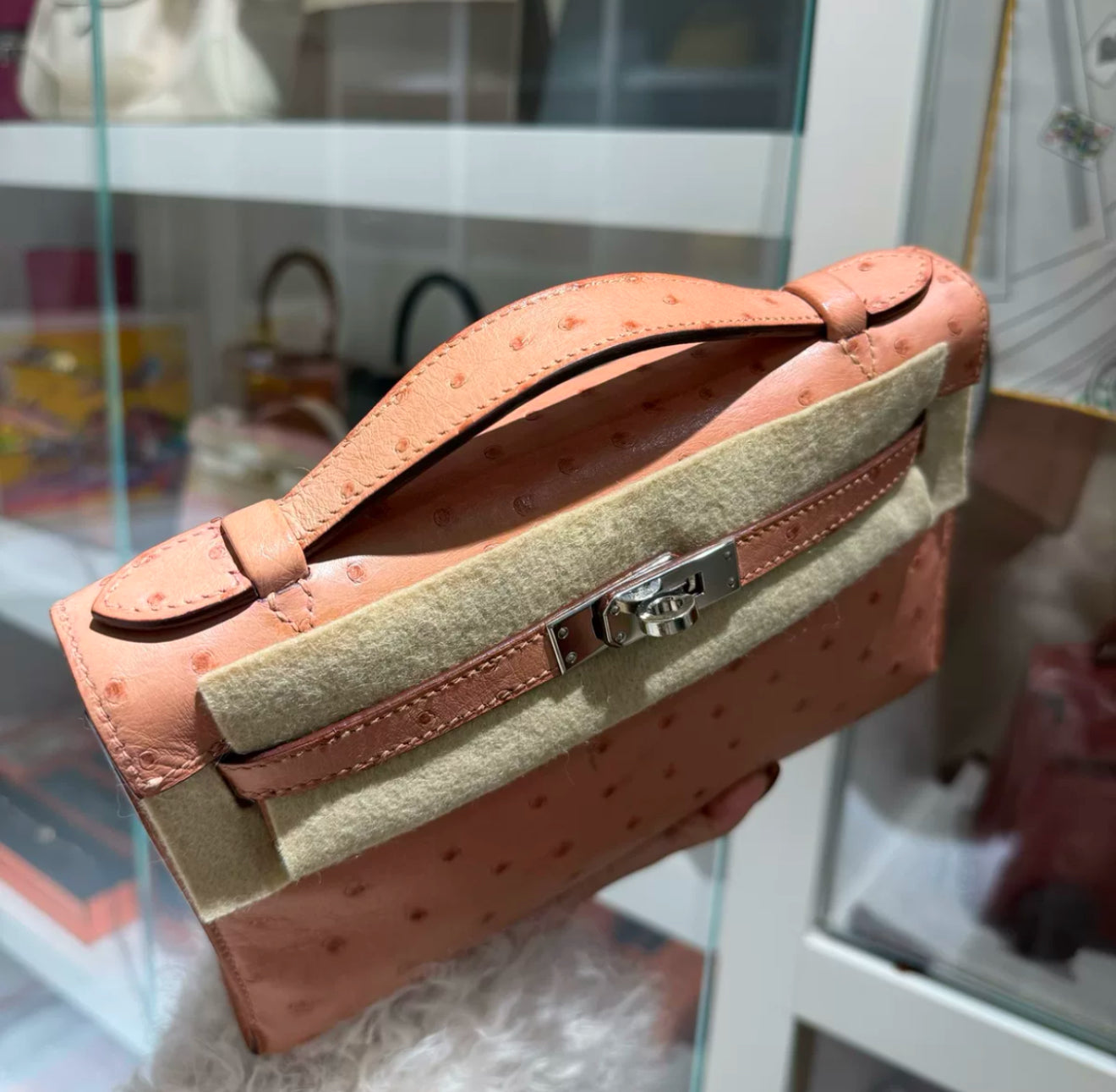 Hermes Kelly Pochette Pink Terre Cuite Ostrich Leather Palladium Hardware
