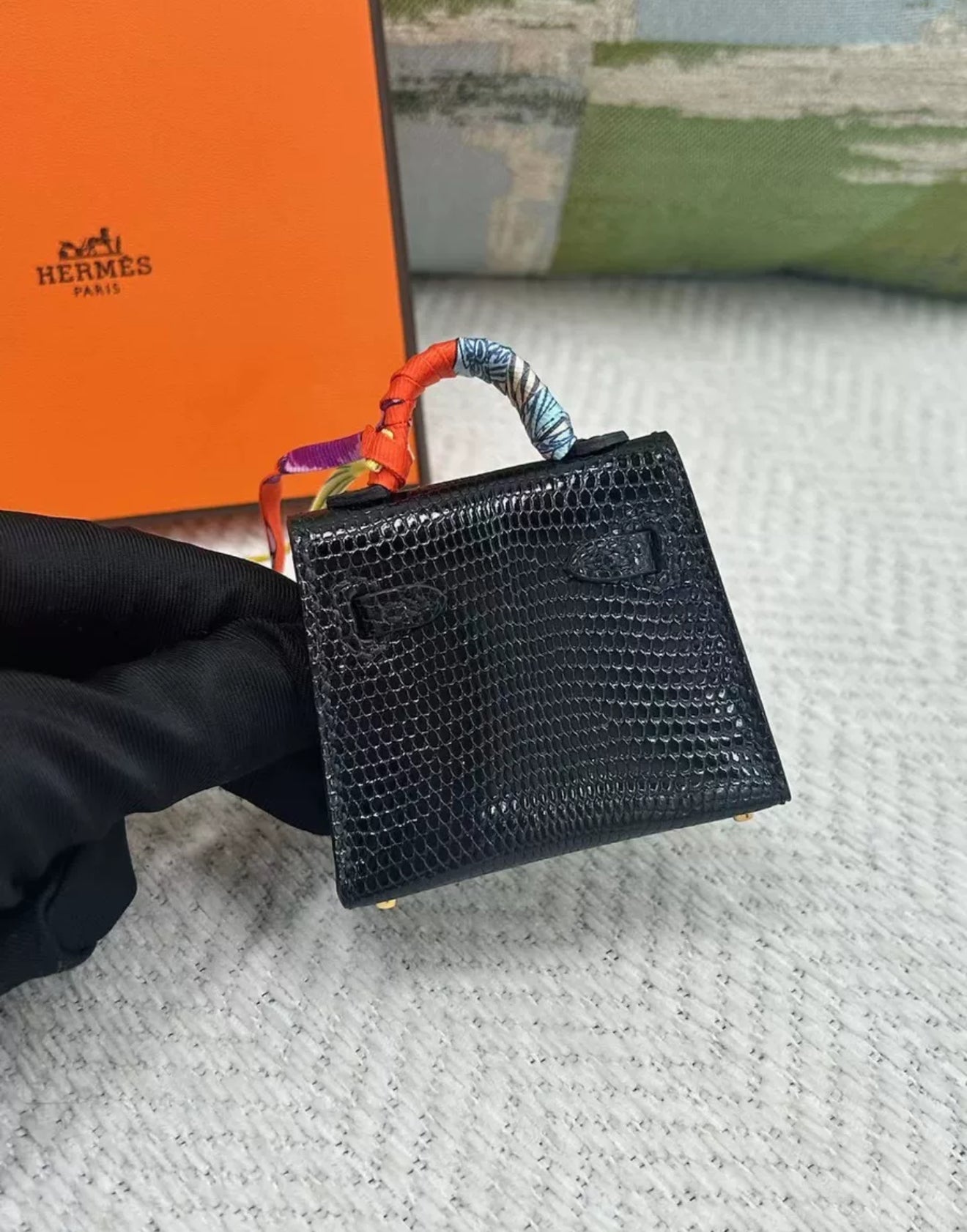 HERMÈS Kelly Twilly charm Noir Lizard Gold Hardware