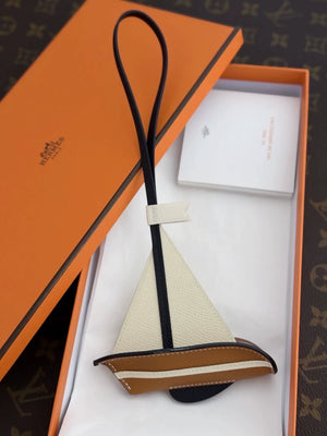 Hermès Epsom Sail 24 Bag Charm Nata/Gold/Black Veau leather