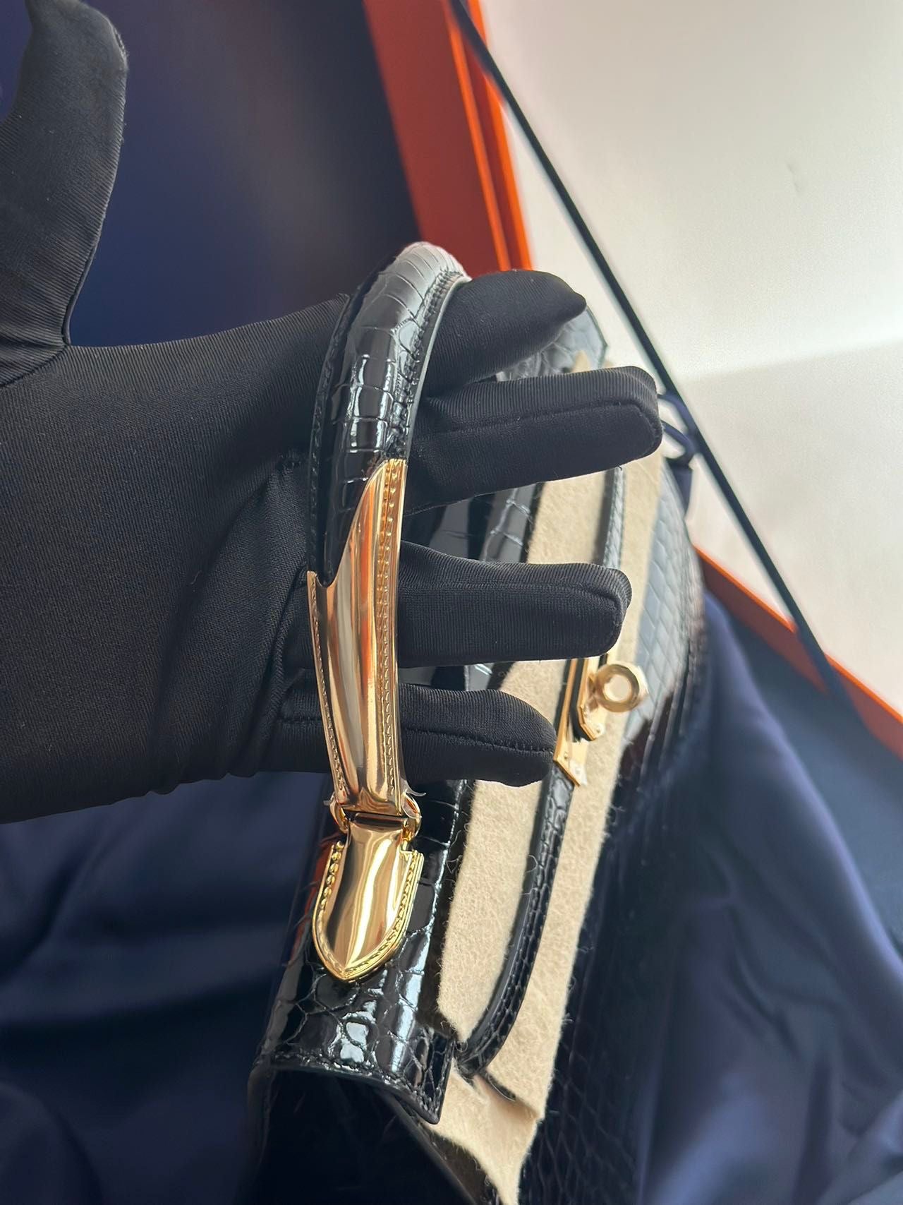 Hermès Kelly Midas 25 Noir Shiny Crocodile Porosus 18k yellow gold hardware  handle