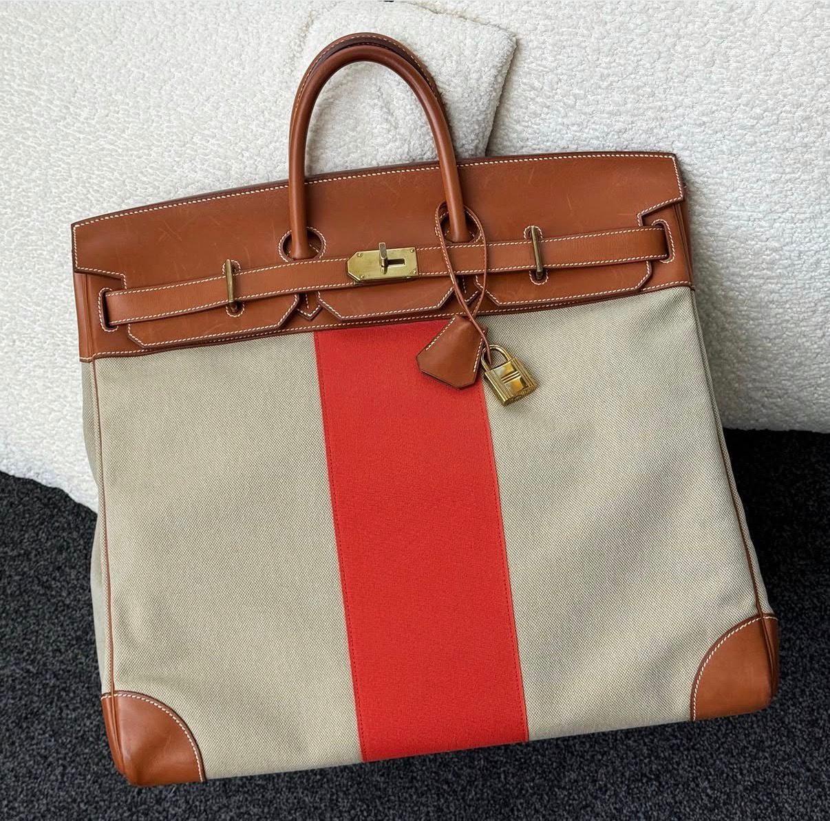 RARE. Hermes Flag HAC 50
Fauve Barenia Ficelle Toile Orange Permabrass hardware