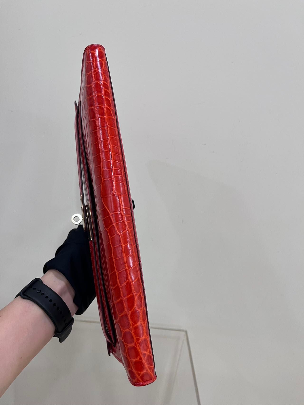 Hermes Kelly cut red shiny crocodile leather gold hardware