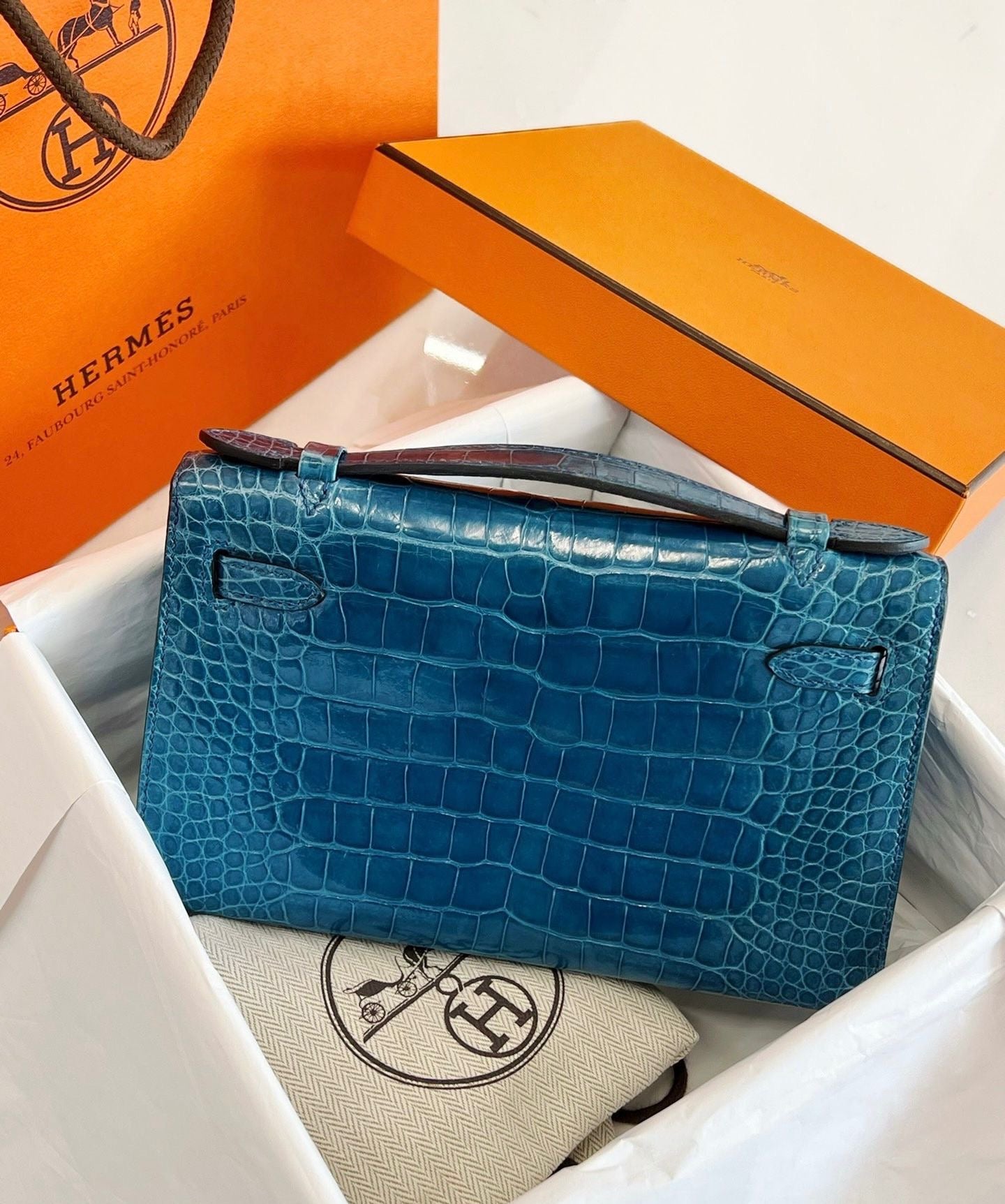Hermes Kelly Pochette Blue Colvert shiny alligator leather gold hardware
