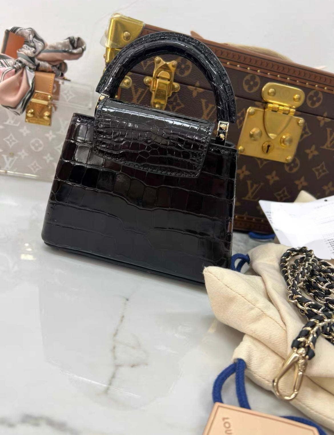LOUIS VUITTON BLACK MINI CAPUCINES BB HANDBAG IN SHINY ALLIGATOR LEATHER WITH GOLD HARDWARE