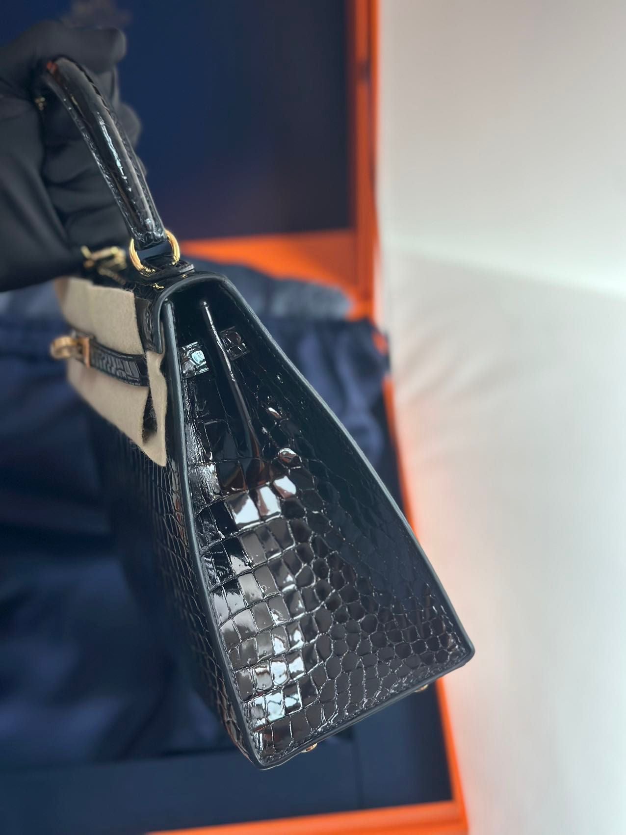 Hermès Kelly Midas 25 Noir Shiny Crocodile Porosus 18k yellow gold hardware  handle