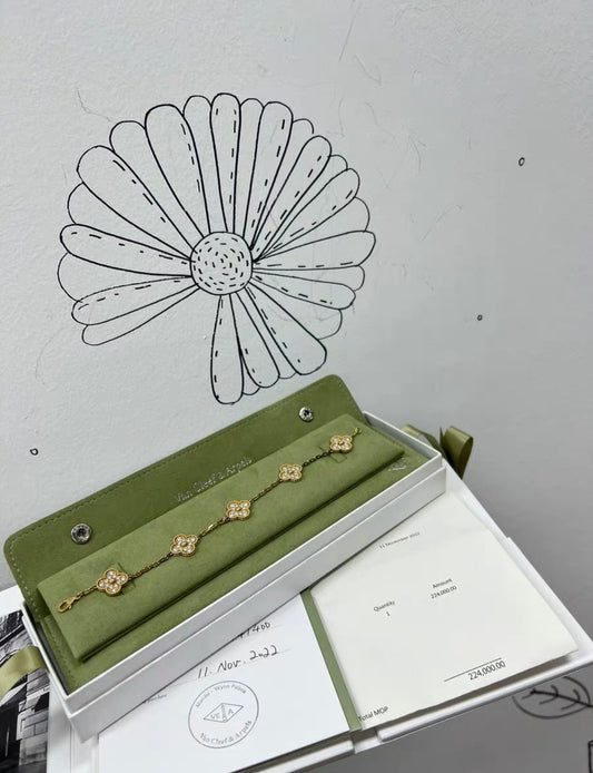 Van Cleef  Arpels Vintage Alhambra 5 diamond motif bracelet in 18k yellow gold