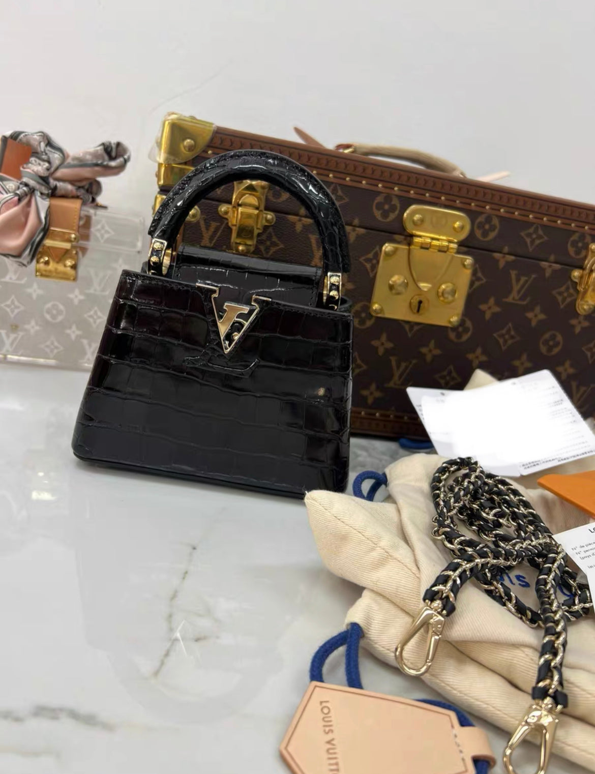 LOUIS VUITTON BLACK MINI CAPUCINES BB HANDBAG IN SHINY ALLIGATOR LEATHER WITH GOLD HARDWARE