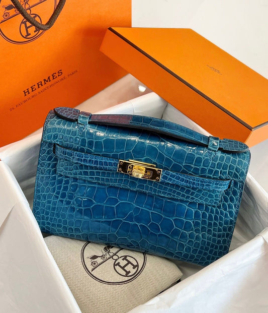 Hermes Kelly Pochette Blue Colvert shiny alligator leather gold hardware