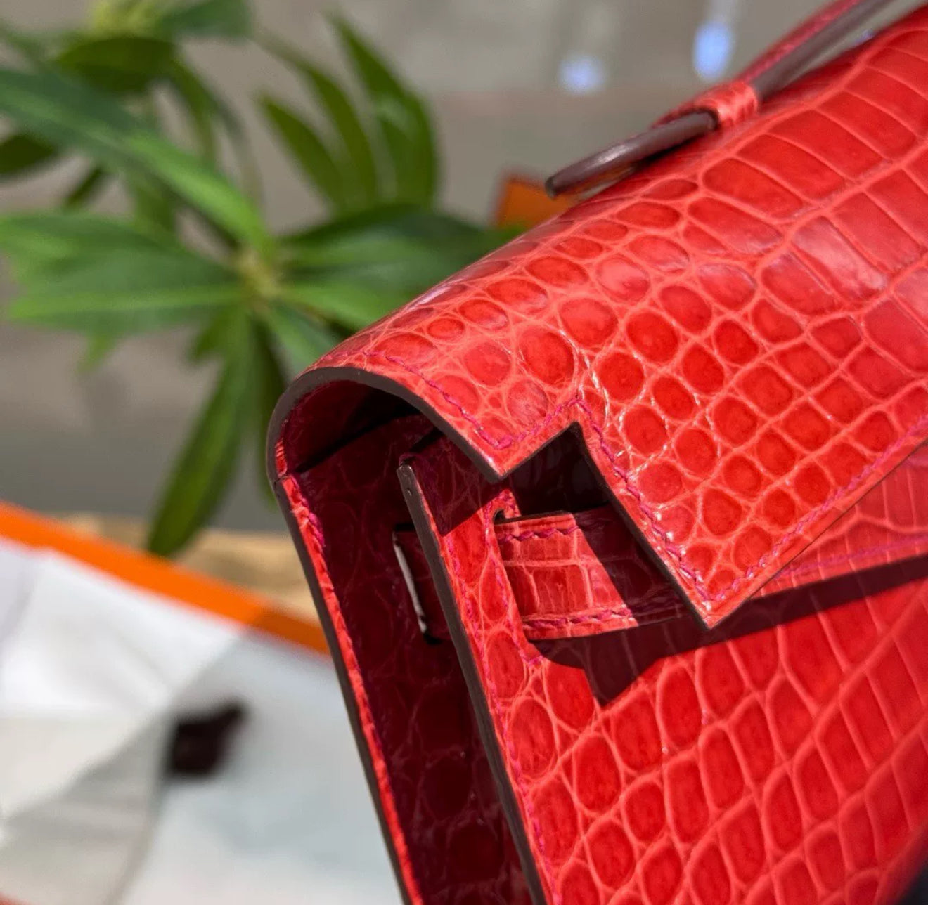 Hermes Kelly cut red shiny crocodile leather palladium hardware