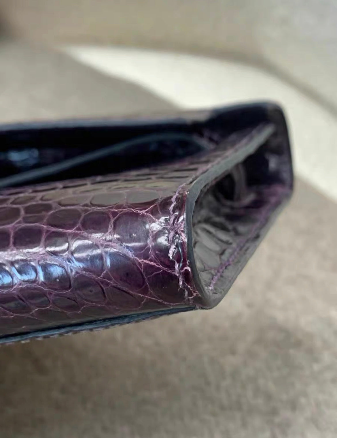 Hermès Kelly Cut Amethysts shiny Crocodile with gold hardware Clutch