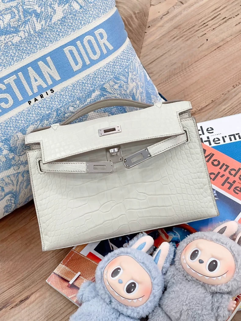 Hermès Kelly pochette Betton matte crocodile leather palladium hardware
