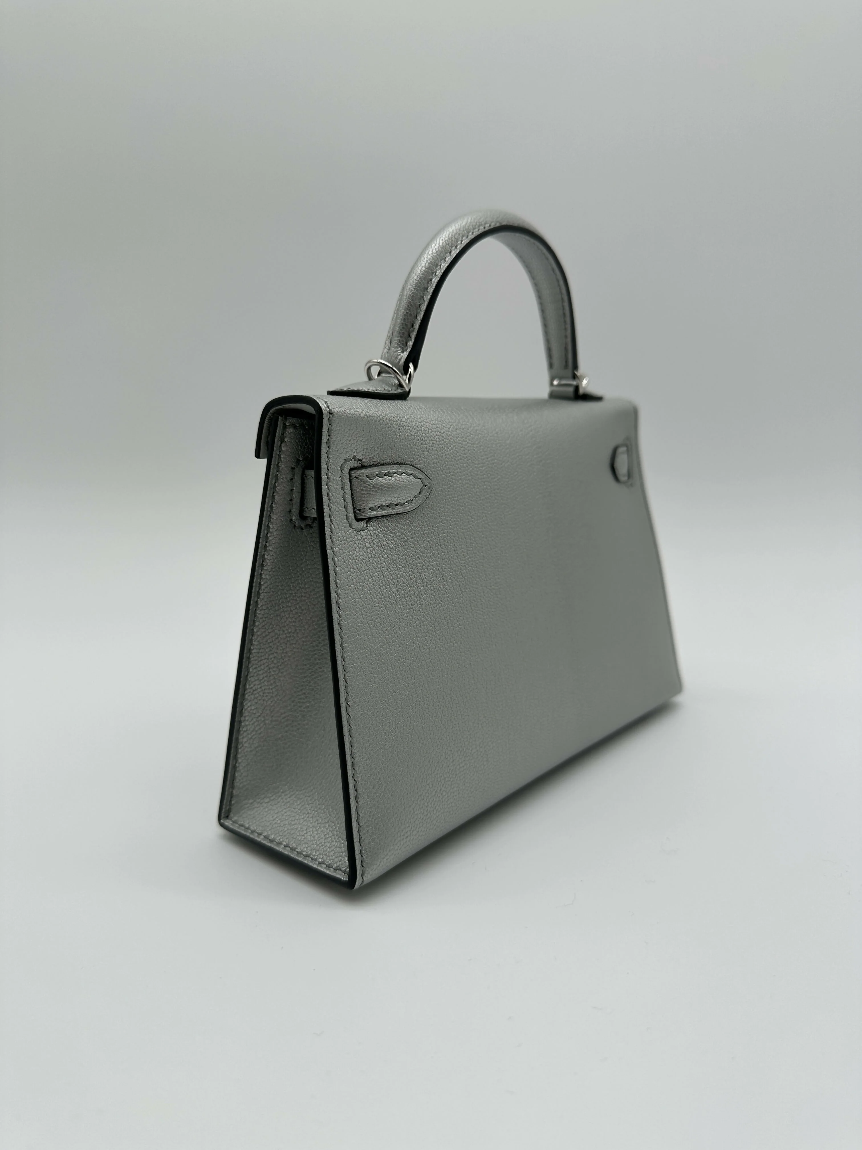 Hermès Kelly 20 Argent Chèvre PHW K 2026