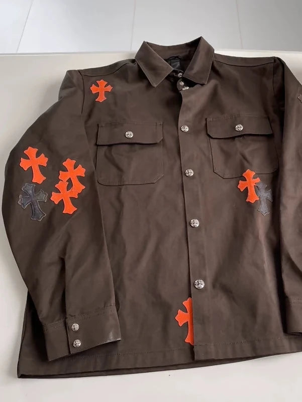 Chrome Hearts brown jacket with orange crosses