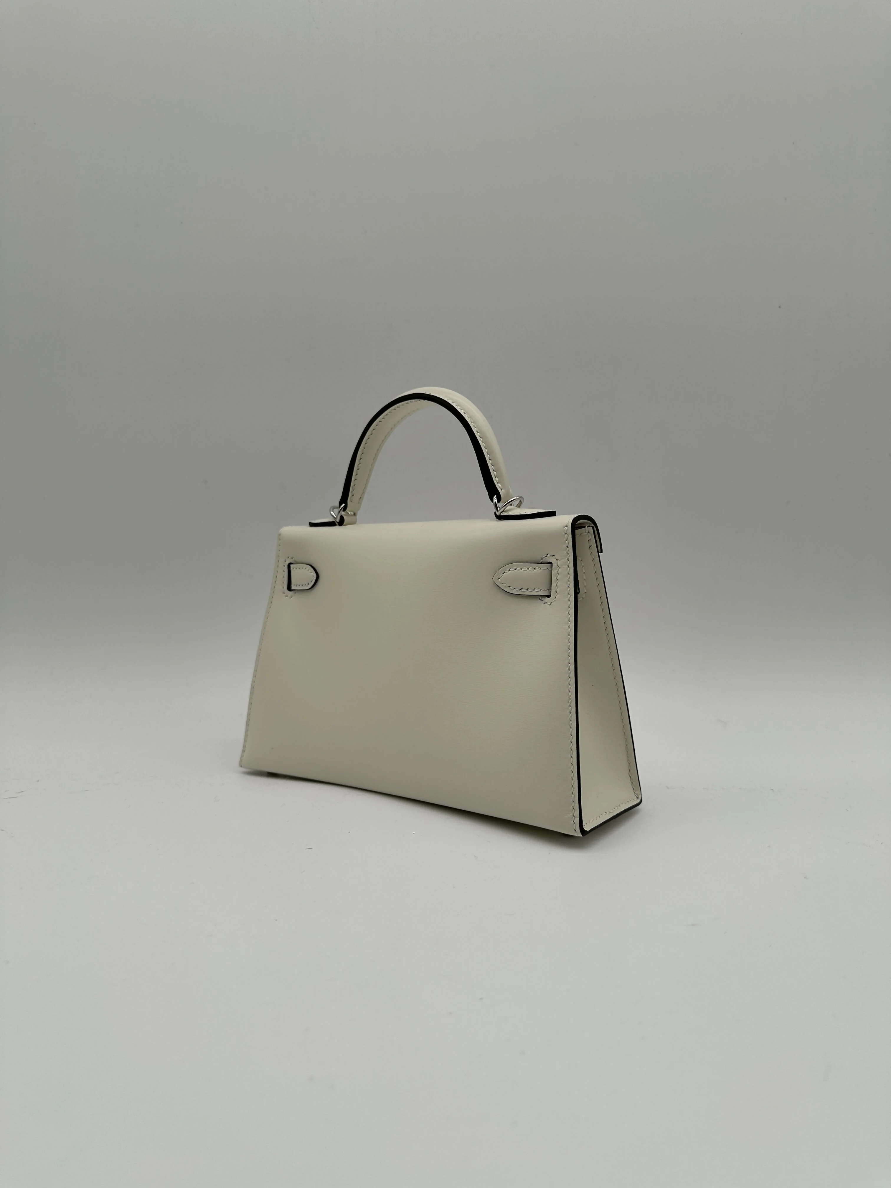 Hermès Kelly 20 Clouté Cream PHW G 2026