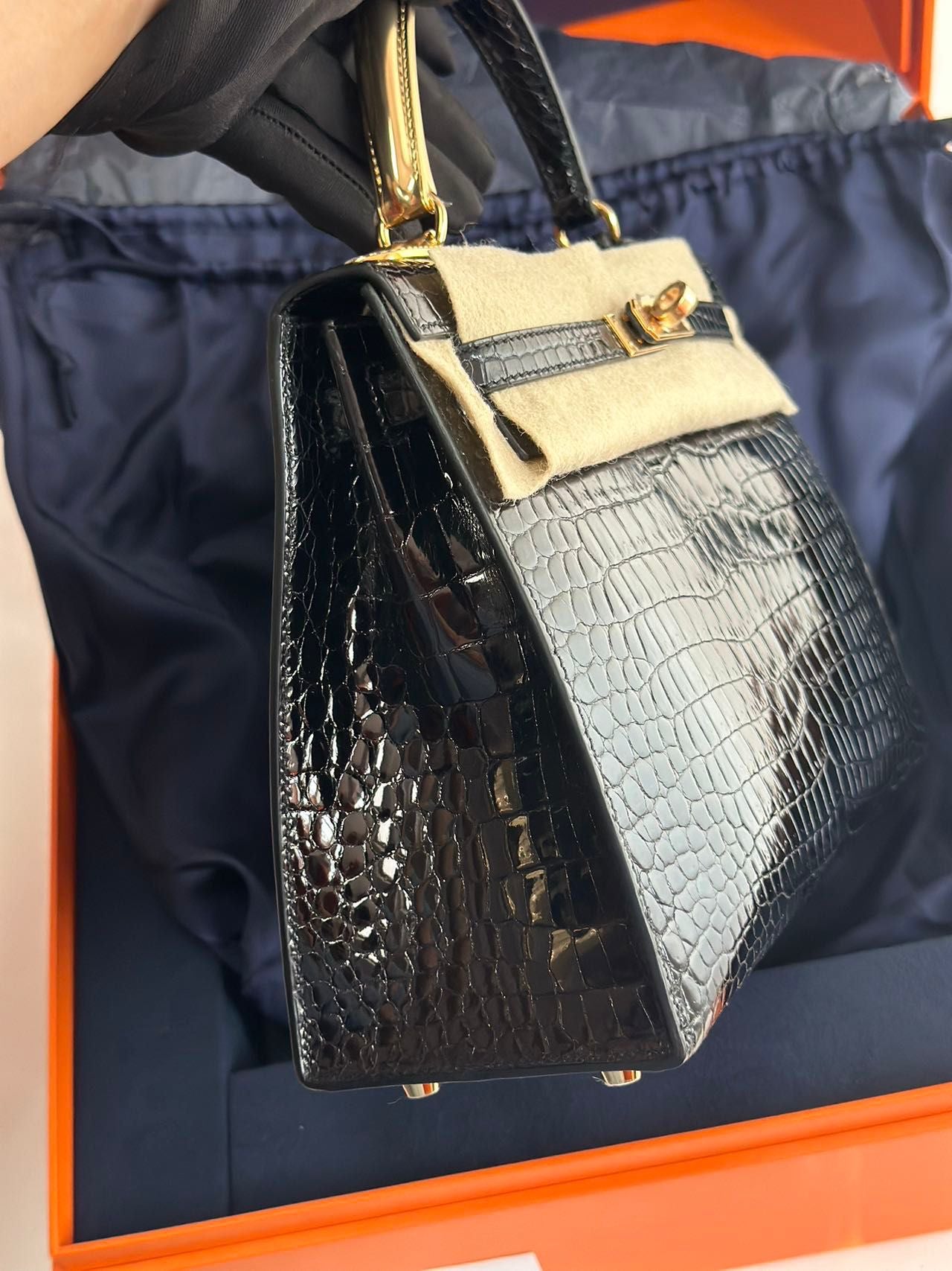 Hermès Kelly Midas 25 Noir Shiny Crocodile Porosus 18k yellow gold hardware  handle