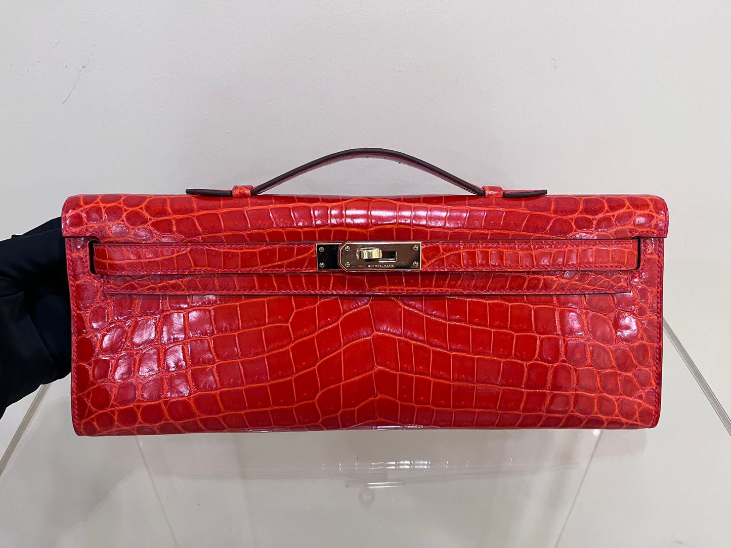Hermes Kelly cut red shiny crocodile leather gold hardware
