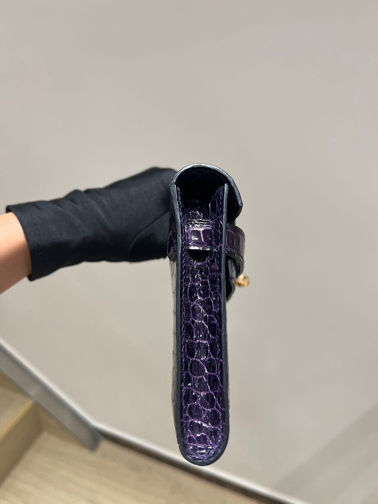 Hermes Kelly cut purple shiny crocodile leather gold hardware