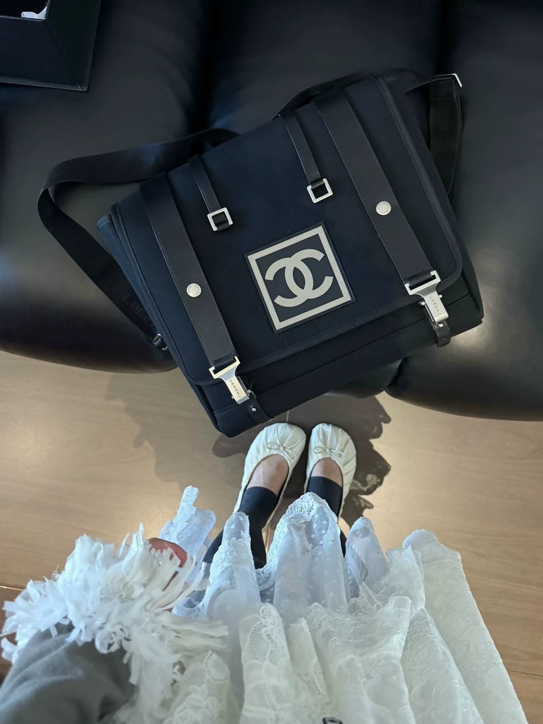Chanel Sport Logo 3-in-1 shoulder bag adorned with a striking black and white logo
