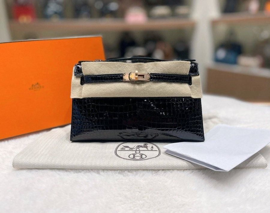Hermès Kelly pochette Black Shiny Alligator Rose gold hardware