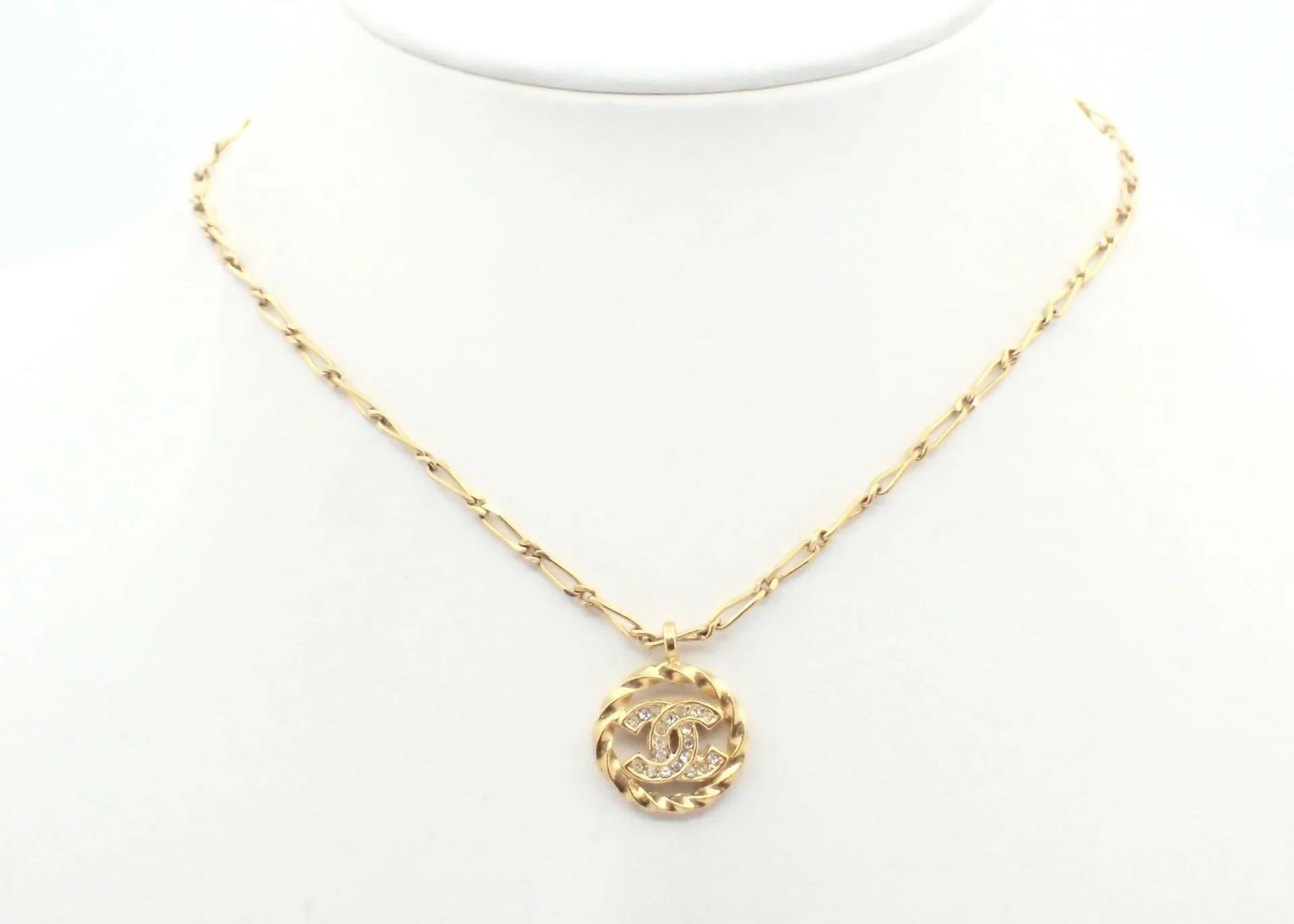 Chanel Vintage 1982 Rhinestone Gold Plated Braided Medallion Interlocking Coco Mark Necklace