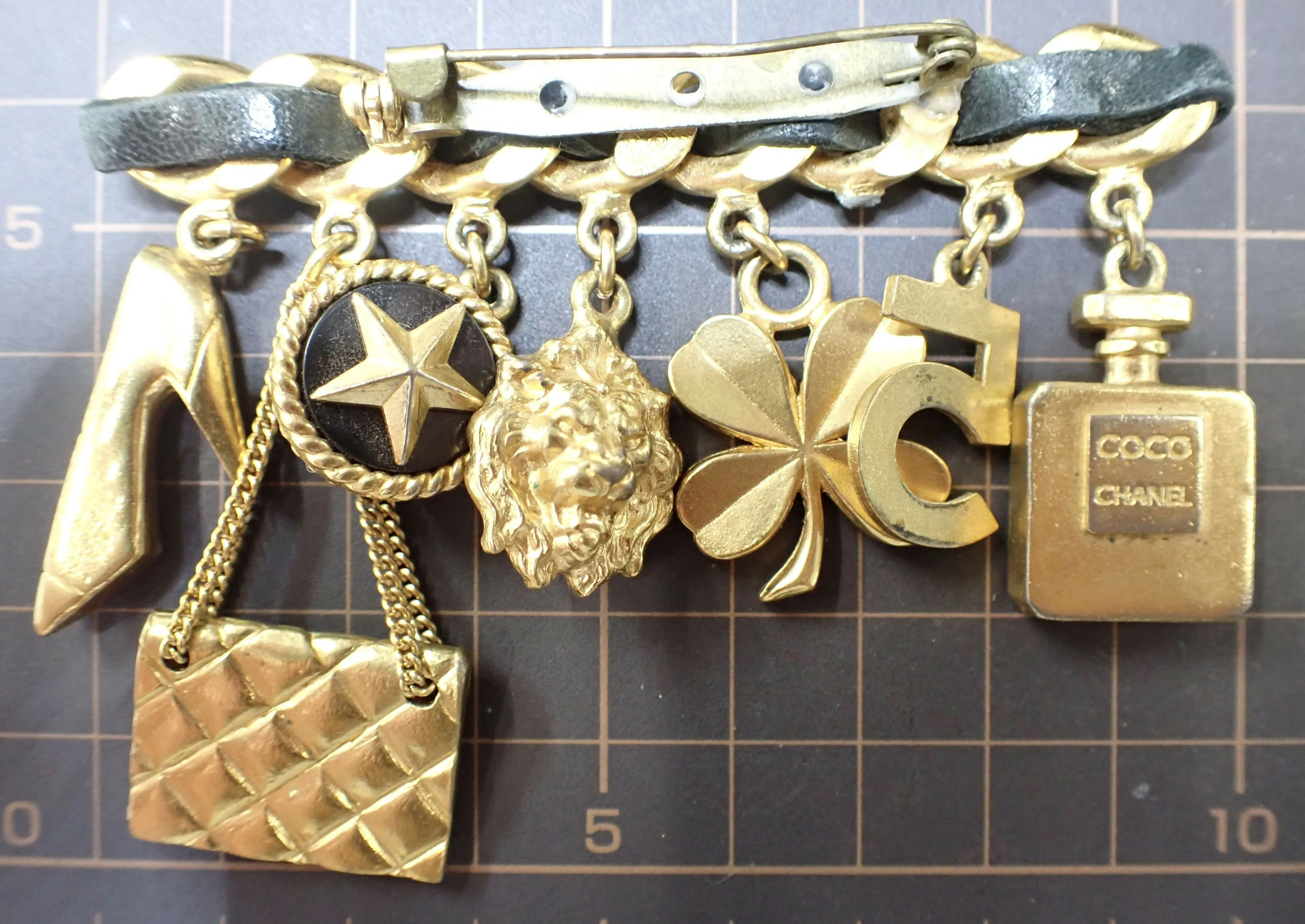Chanel Vintage 96P Gold Plated & Leather Perfume Bottle Shoe Camellia Quilted Bag Charm Brooch
