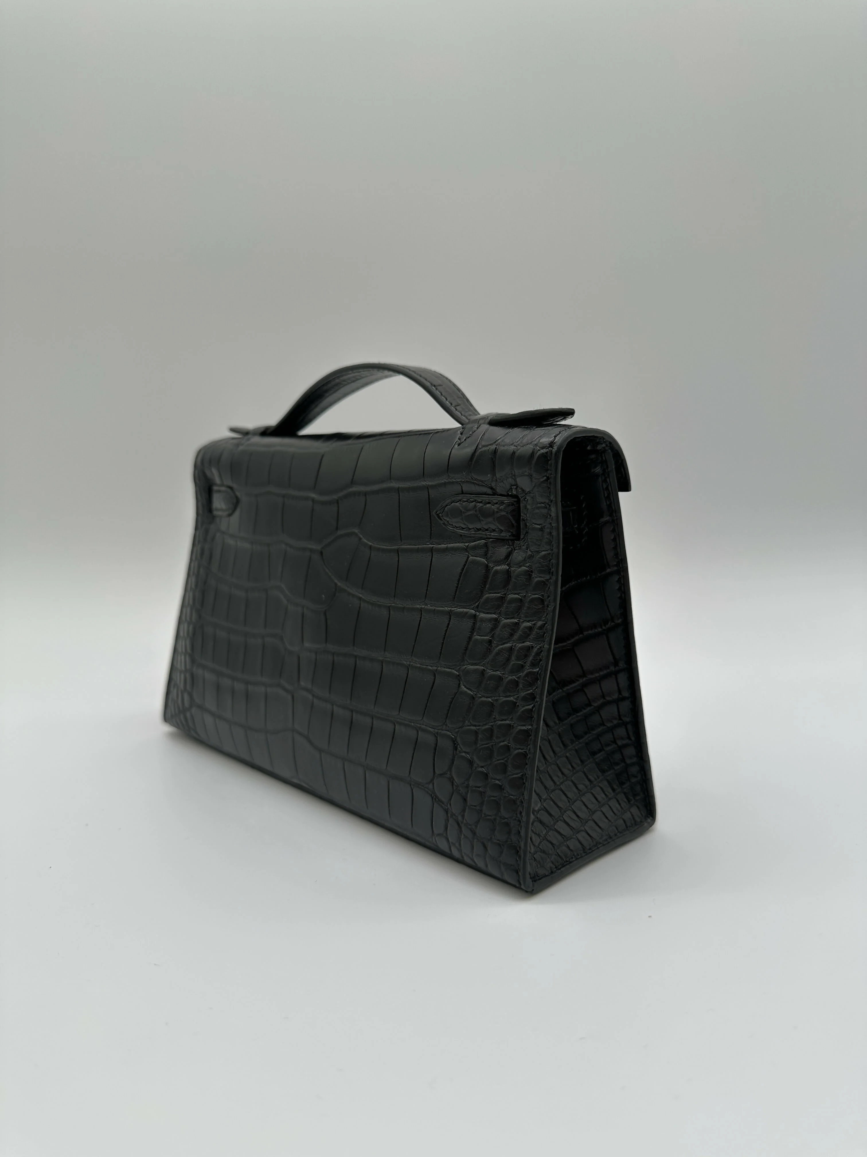 Hermès Kelly Pochette Black Matte PHW K 2025