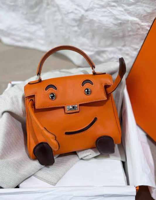 Hermès Kelly doll orange swift leather palladium hardware