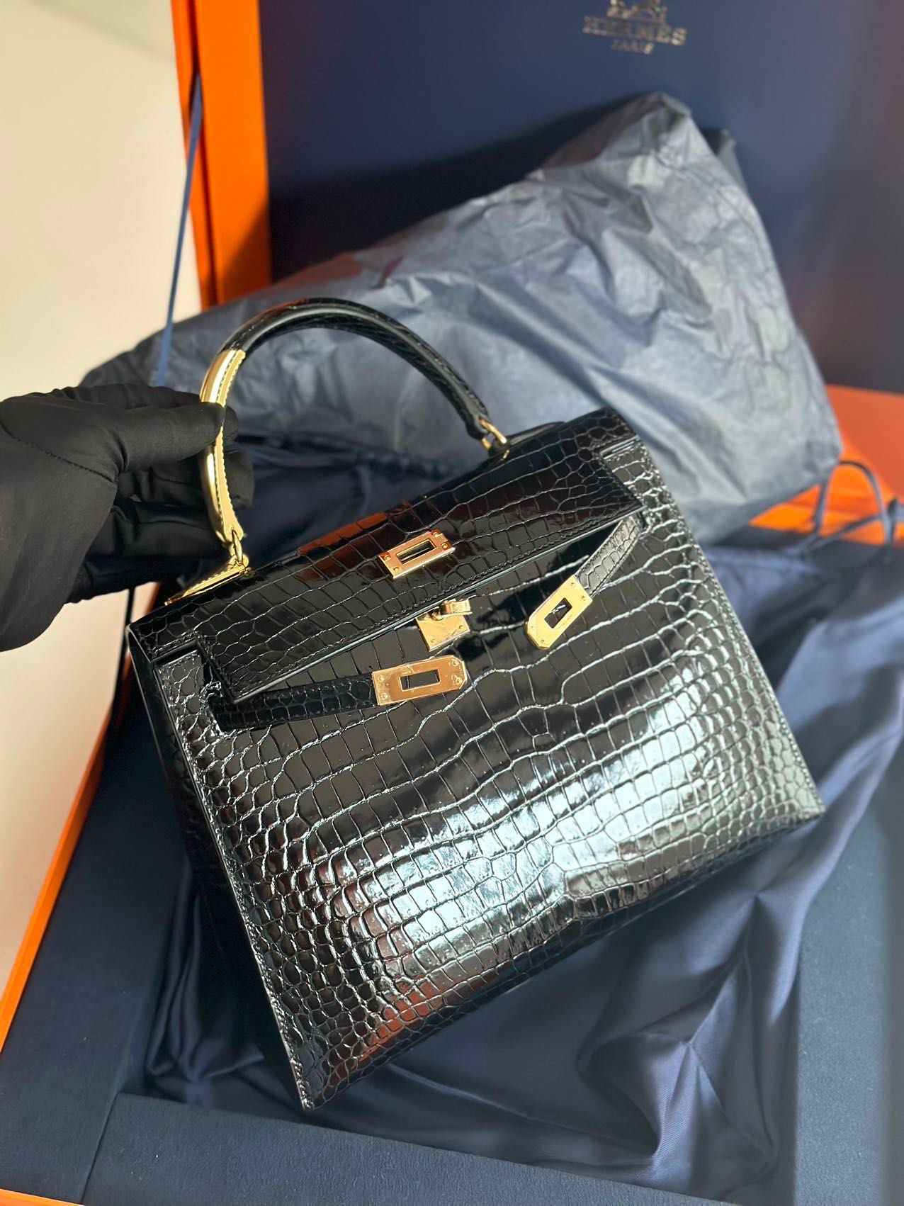 Hermès Kelly Midas 25 Noir Shiny Crocodile Porosus 18k yellow gold hardware  handle